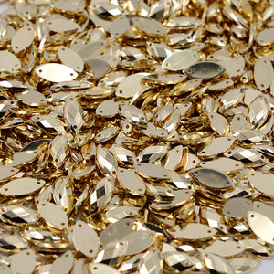 Acrílico Navette Oro Metálico 7x15mm c/100 piezas